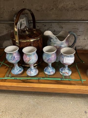 Pink ceramic goblets and pitcher set