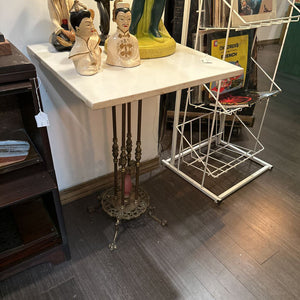 Marble top table with brass base