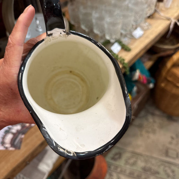 Black and white enamel pitcher with flower (as found) perfect for floral arrangements