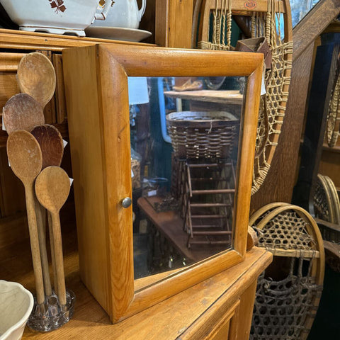 Vintage medicine cabinet with mirrored door