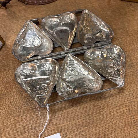 Antique heart-shaped mold