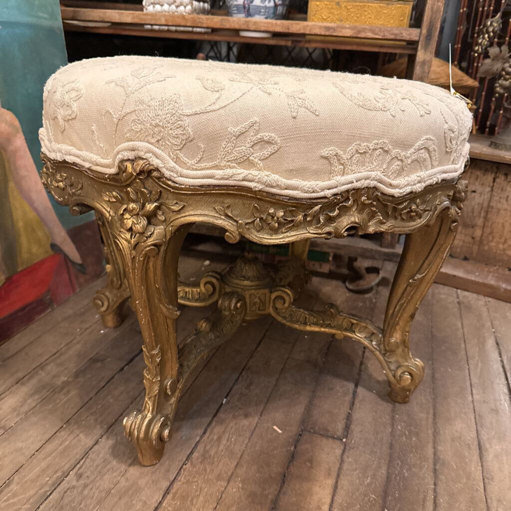 Upholstered gold gilt footstool