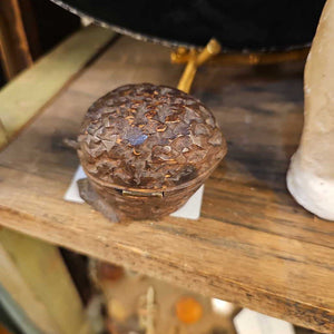 Carved acorn ink well as is