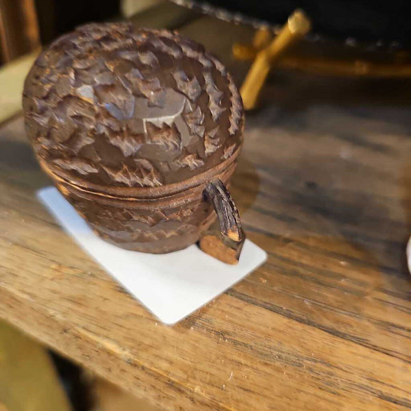 Carved acorn ink well as is