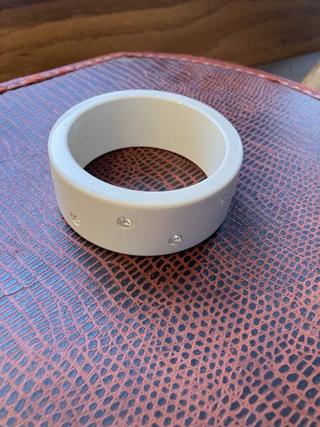 Vintage white and diamond Bakelite bangle