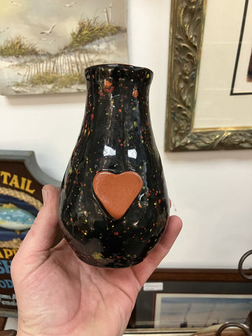 Signed black speckled ceramic flower planter with heart