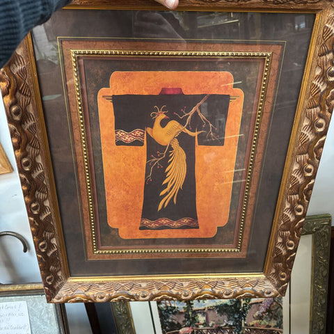 Japanese kimono print in ornately carved wood frame