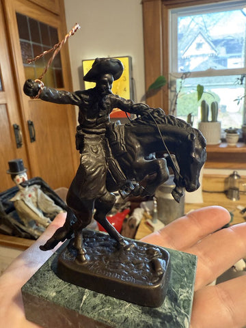 Vintage bronze miniature Bronco Buster on marble base