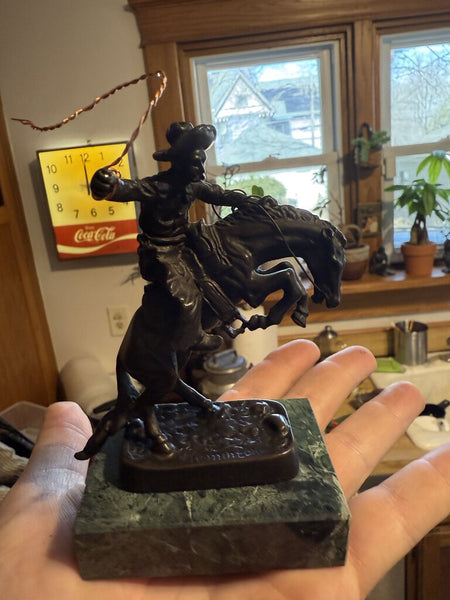 Vintage bronze miniature Bronco Buster on marble base