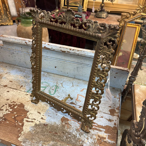 Ornate large brass frame