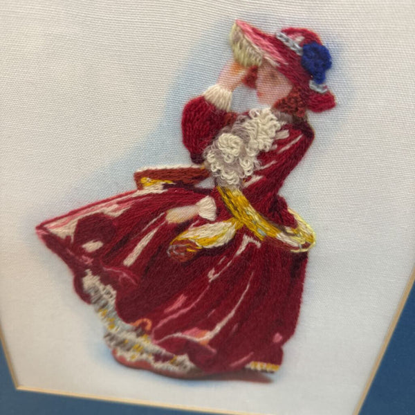 Vintage pair of embroidered women in red dresses
