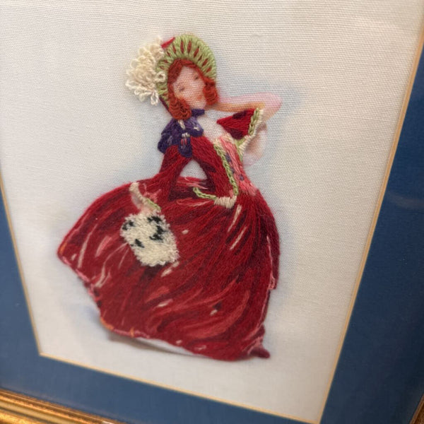 Vintage pair of embroidered women in red dresses