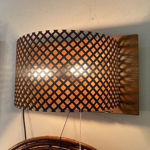 Repurposed architectural wall sconce