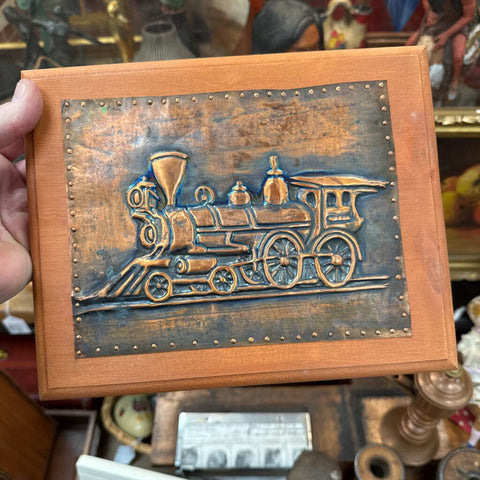 Vintage embossed copper steam engine