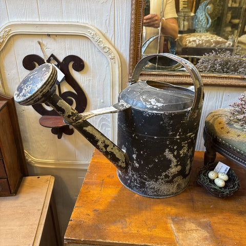 Large black chippy watering can