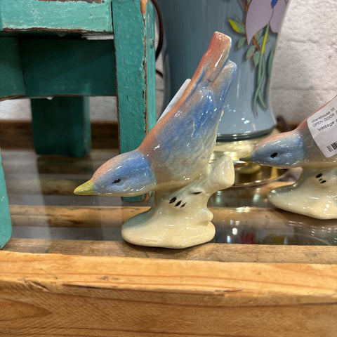 Vintage ceramic bird figurine each