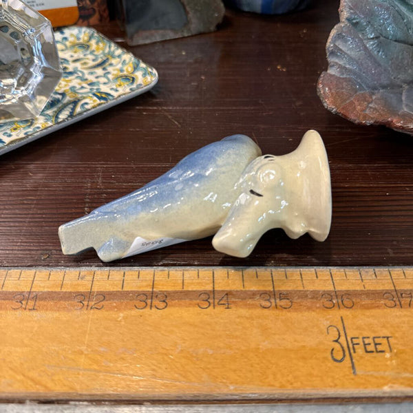 Vintage ceramic bird figurine each