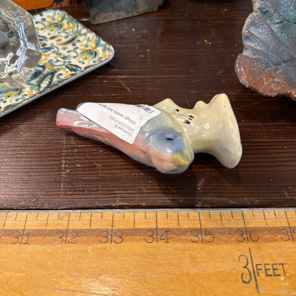 Vintage ceramic bird figurine each