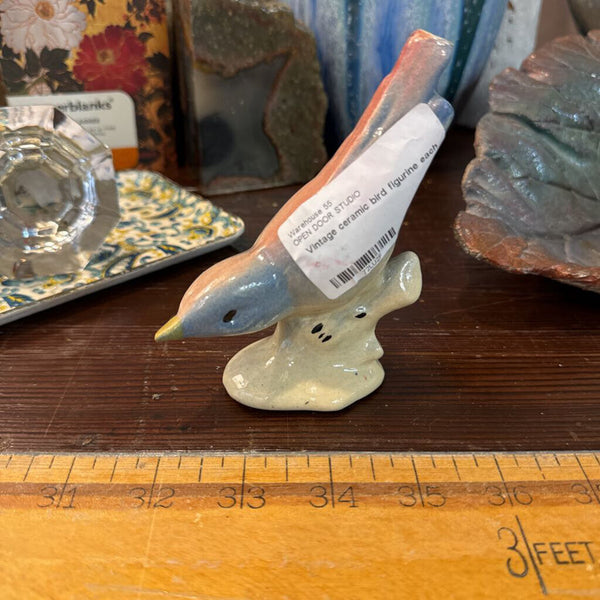 Vintage ceramic bird figurine each