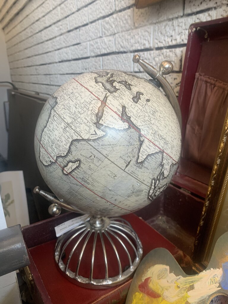 Globe on silver metal base