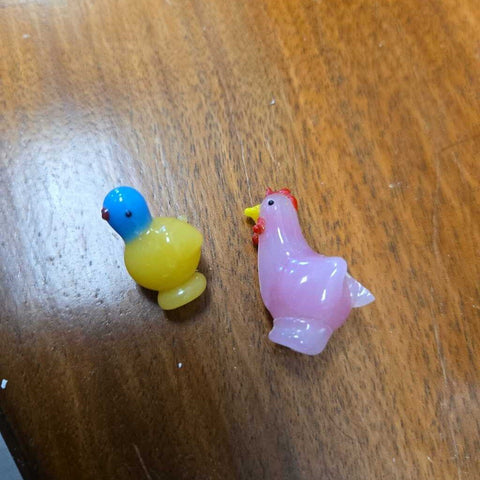 2 mini glass chicks