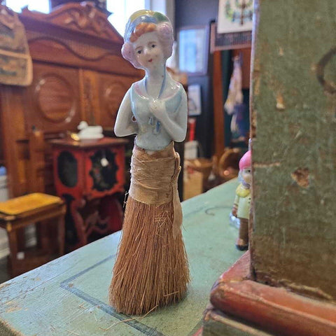 Half doll lint brush 7" tall