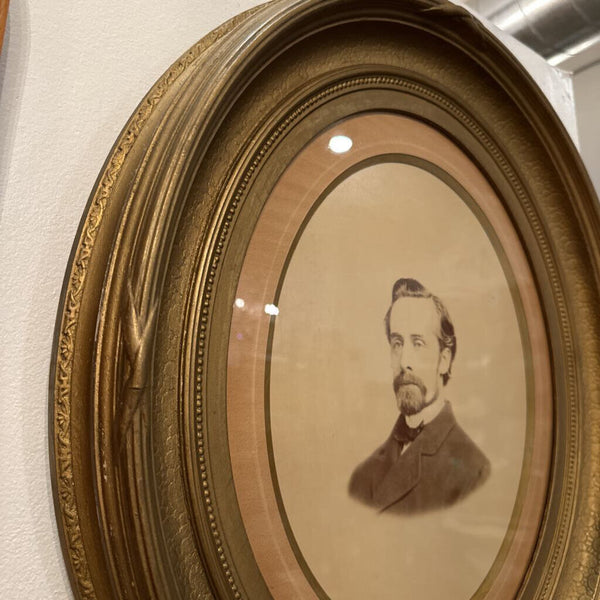 PORTRAIT IN ANTIQUE OVAL FRAME 23" x 21". IN STORE PICKUP