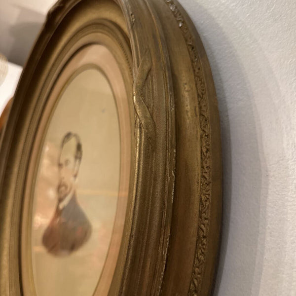 PORTRAIT IN ANTIQUE OVAL FRAME 23" x 21". IN STORE PICKUP