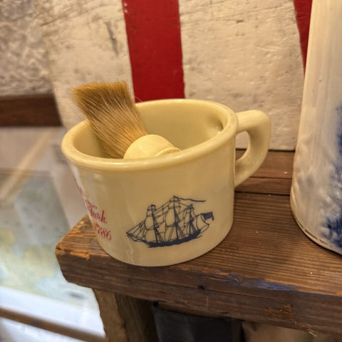 Old spice mug and brush