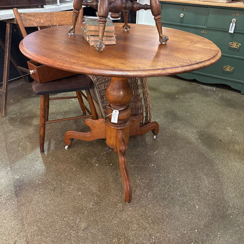 Beautiful Antique Round Wood Pedestal Table on Casters. 30 in Diameter x30H. IN STORE PICK UP ONLY