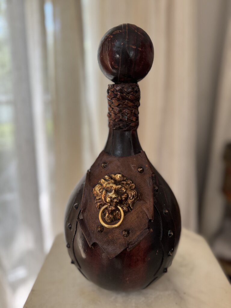 Leather wrapped Italian bottle with lion