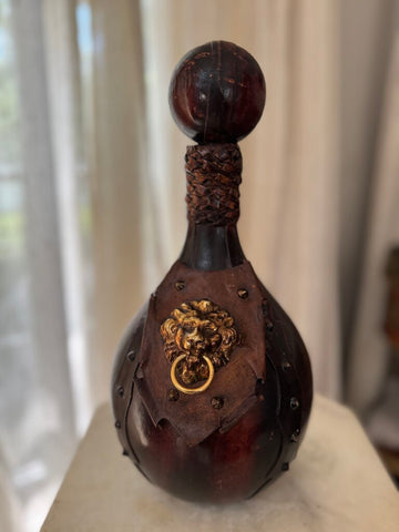 Leather wrapped Italian bottle with lion