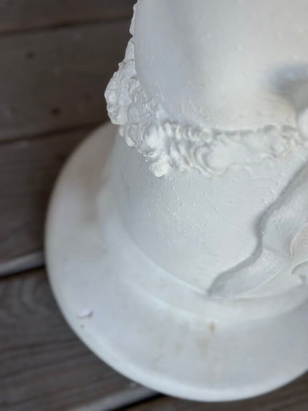 Plaster bow detail pedestal