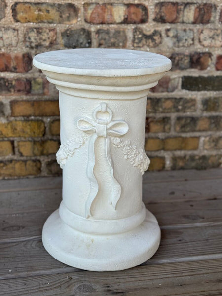Plaster bow detail pedestal