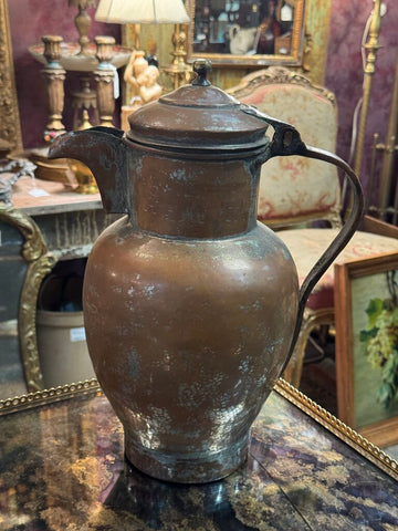 Antique copper pitcher