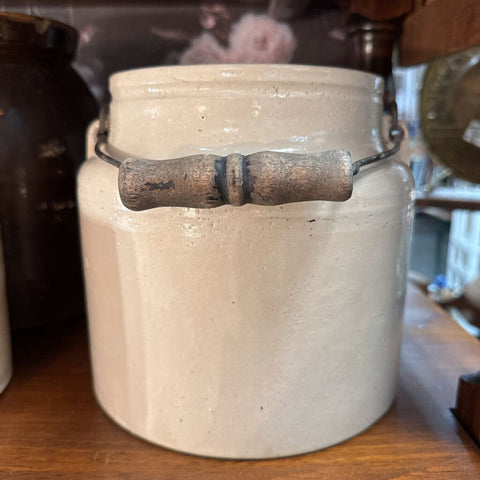 Primitive cream glazed jar with wood handle