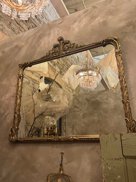 0317 Antique wood gilt wall mirror with fleur de lis top