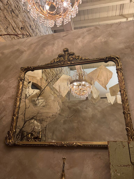 0317 Antique wood gilt wall mirror with fleur de lis top