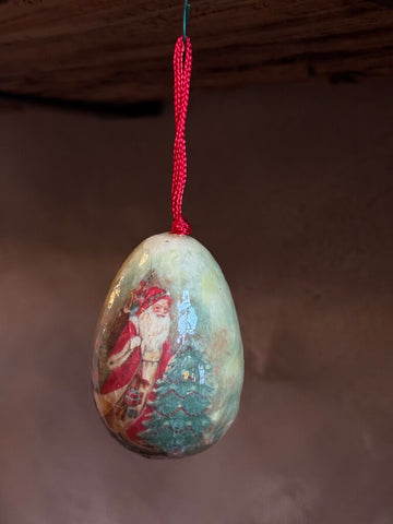 0683 egg shaped paper mache santa ornament