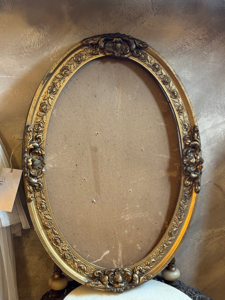 0687 ornate oval gilt wood frame