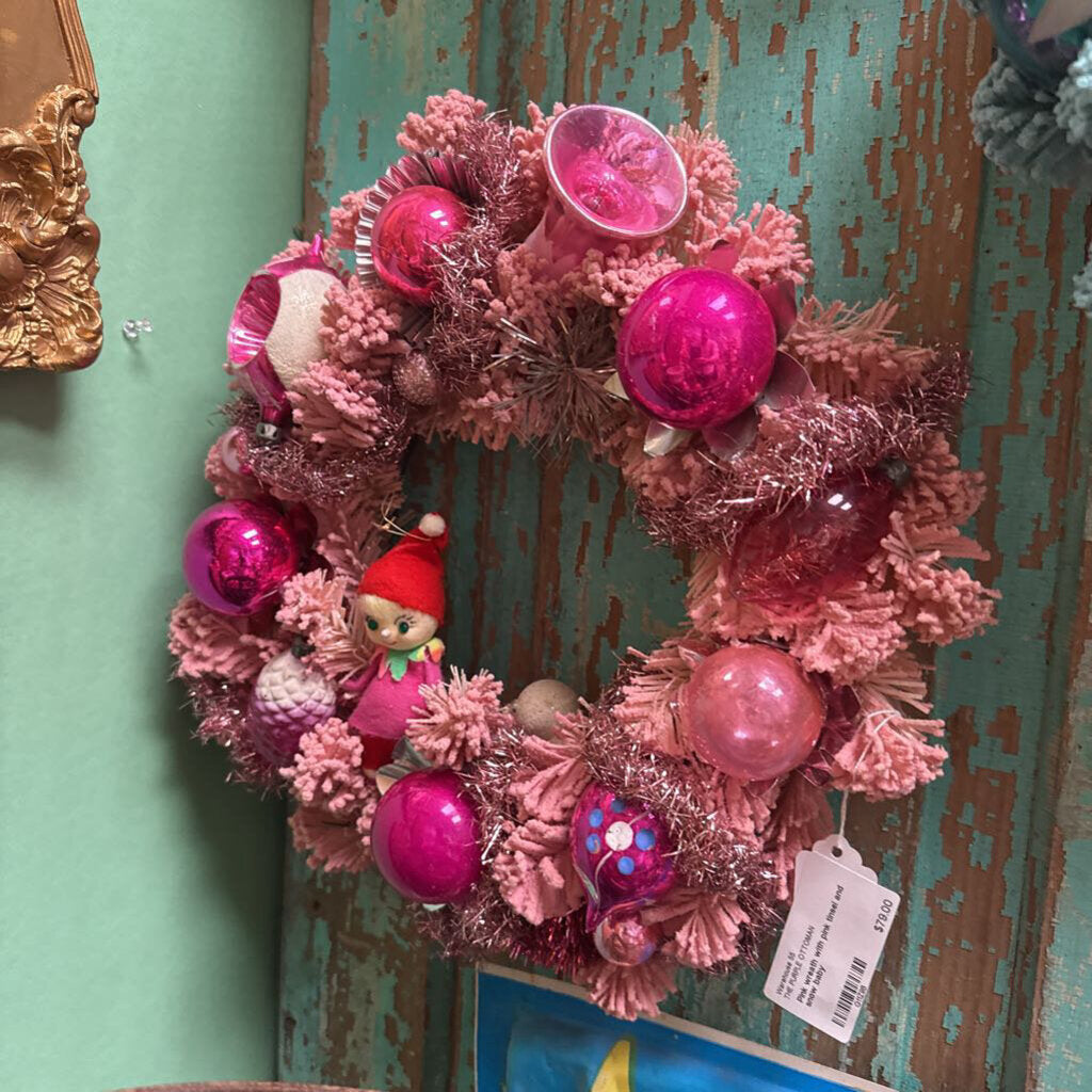Pink wreath with pink tinsel and snow baby