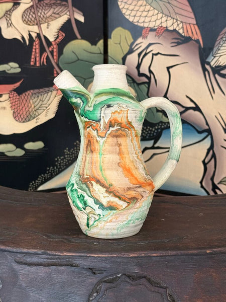 K- Nemadji ribbed jug orange and green glaze with handle 8 tall x 6.5 wide