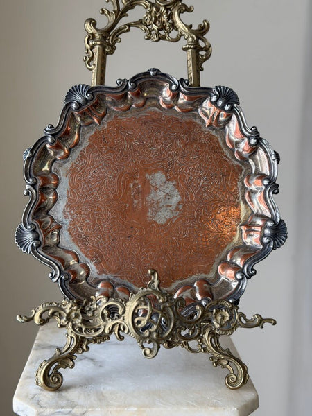 0955 English Silverplate over copper footed round tray