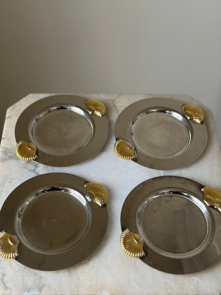 1149 Four silverplate shell coasters
