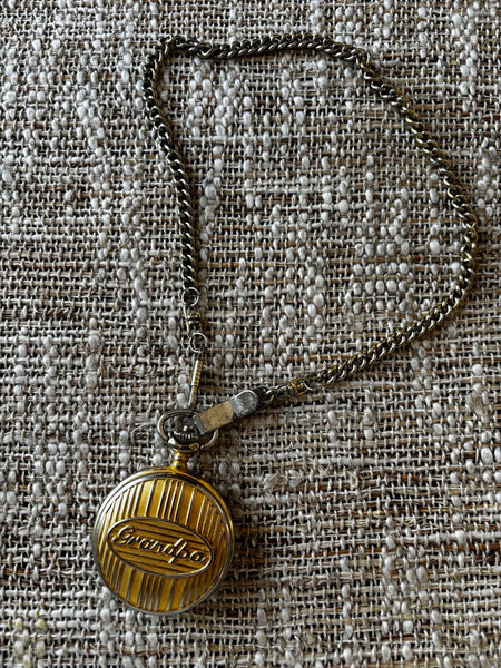 Vintage Pocket Watch w/ Grandpa on Front (Works)