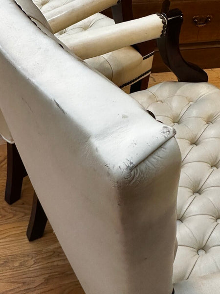 PAIR OF JASPER SEATING ANILINE-DYED WHITE LEATHER AND WOOD TUFTED ARMCHAIRS WITH BRASS NAILHEAD TRIM, AS FOUND. 35"H x 27"D x 24"W. IN STORE PICKUP.