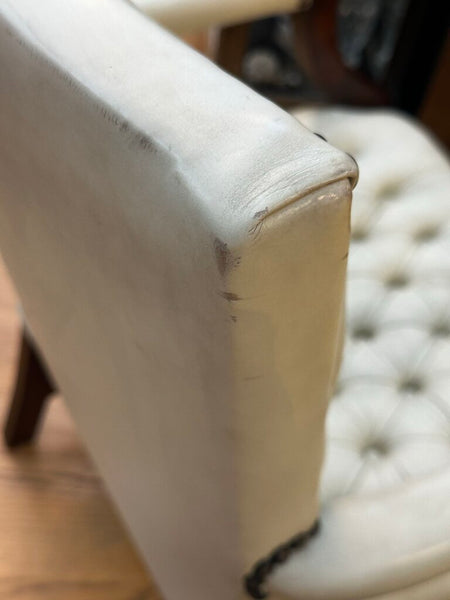 PAIR OF JASPER SEATING ANILINE-DYED WHITE LEATHER AND WOOD TUFTED ARMCHAIRS WITH BRASS NAILHEAD TRIM, AS FOUND. 35"H x 27"D x 24"W. IN STORE PICKUP.