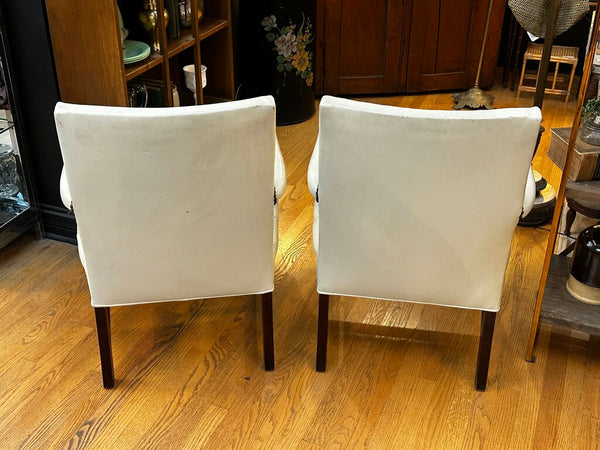 PAIR OF JASPER SEATING ANILINE-DYED WHITE LEATHER AND WOOD TUFTED ARMCHAIRS WITH BRASS NAILHEAD TRIM, AS FOUND. 35"H x 27"D x 24"W. IN STORE PICKUP.