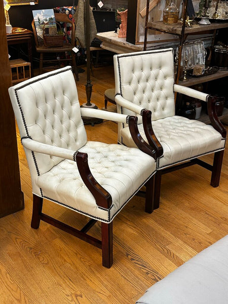 PAIR OF JASPER SEATING ANILINE-DYED WHITE LEATHER AND WOOD TUFTED ARMCHAIRS WITH BRASS NAILHEAD TRIM, AS FOUND. 35"H x 27"D x 24"W. IN STORE PICKUP.