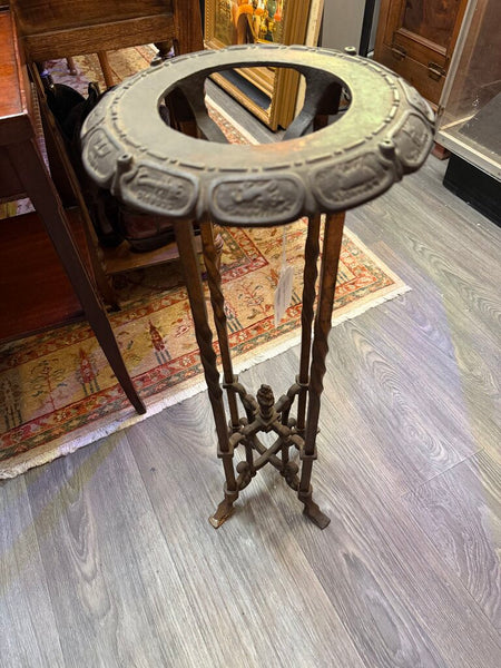 Victorian cast iron stand with zodiac motif
